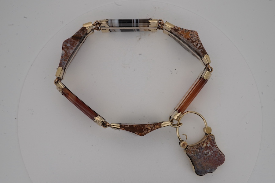 A Victorian engraved yellow metal mounted hardstone bracelet, with padlock clasp(a,f,). Condition - poor